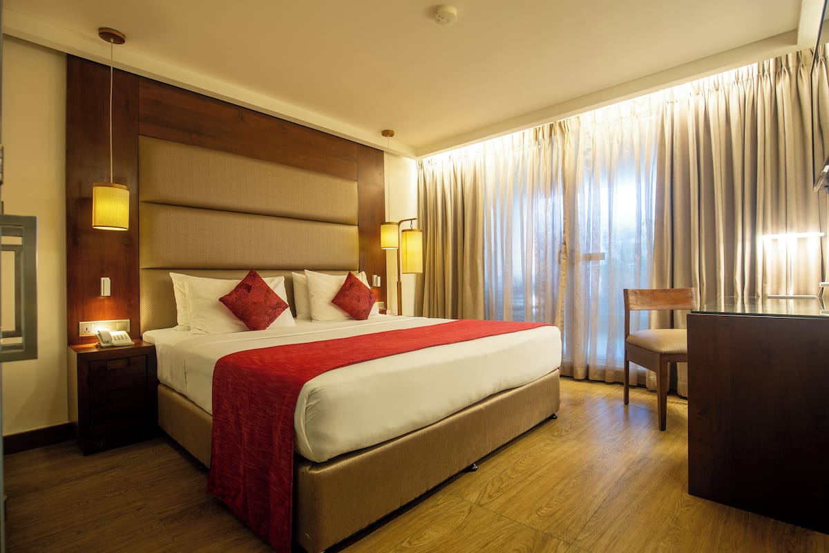 Deluxe Room, 1 Bedroom | 1 bedroom, Egyptian cotton sheets, premium bedding, minibar