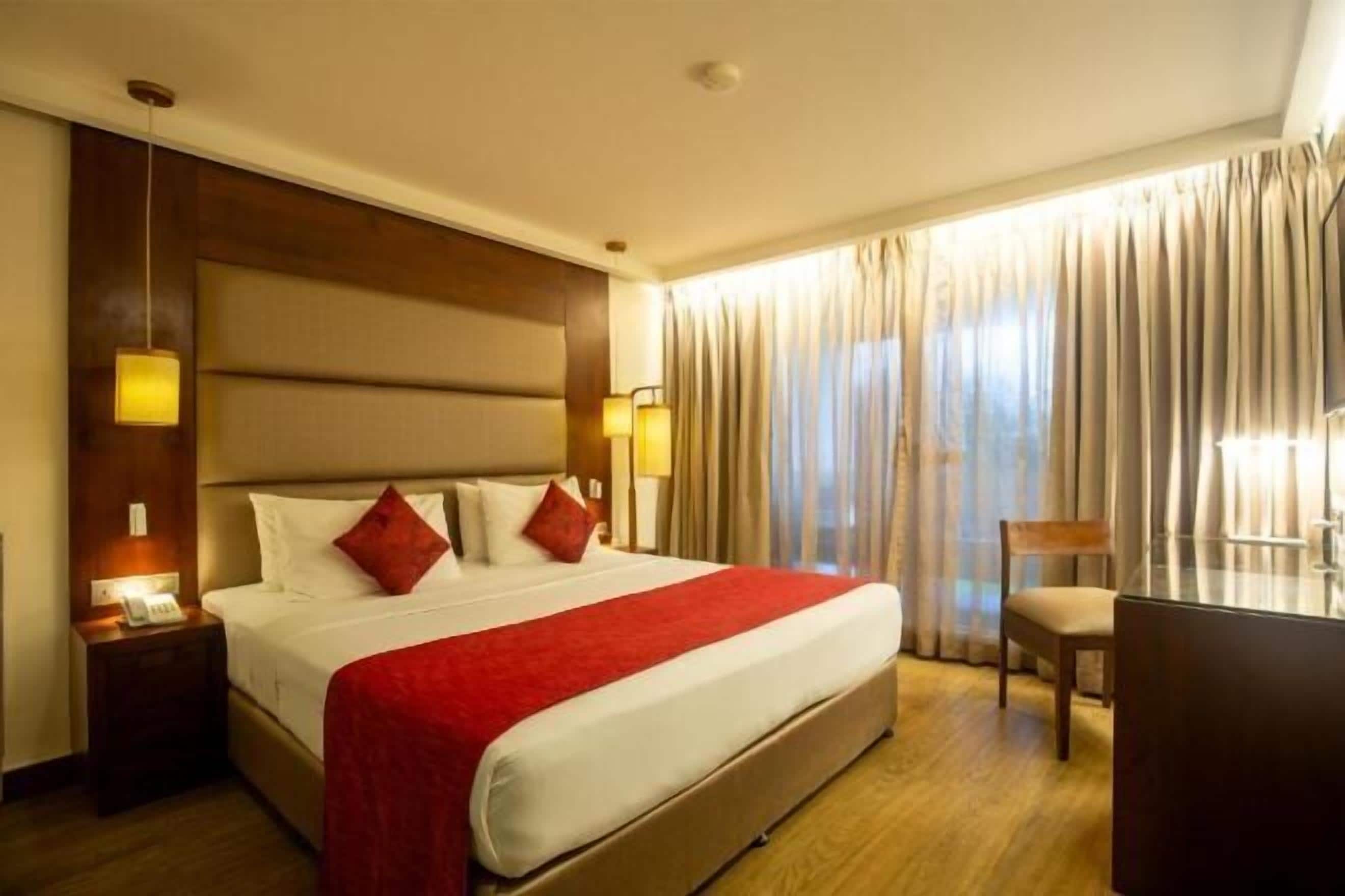 Egyptian cotton sheets, premium bedding, minibar, in-room safe