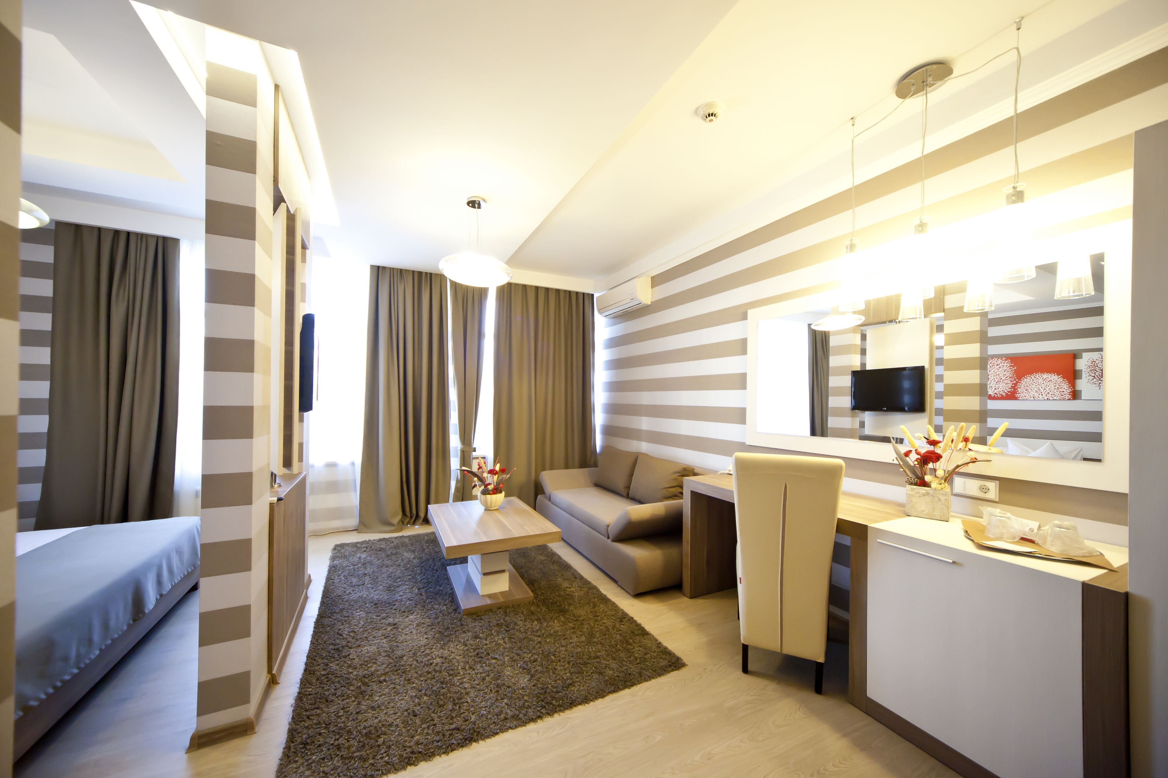 junior suite | living area | tv
