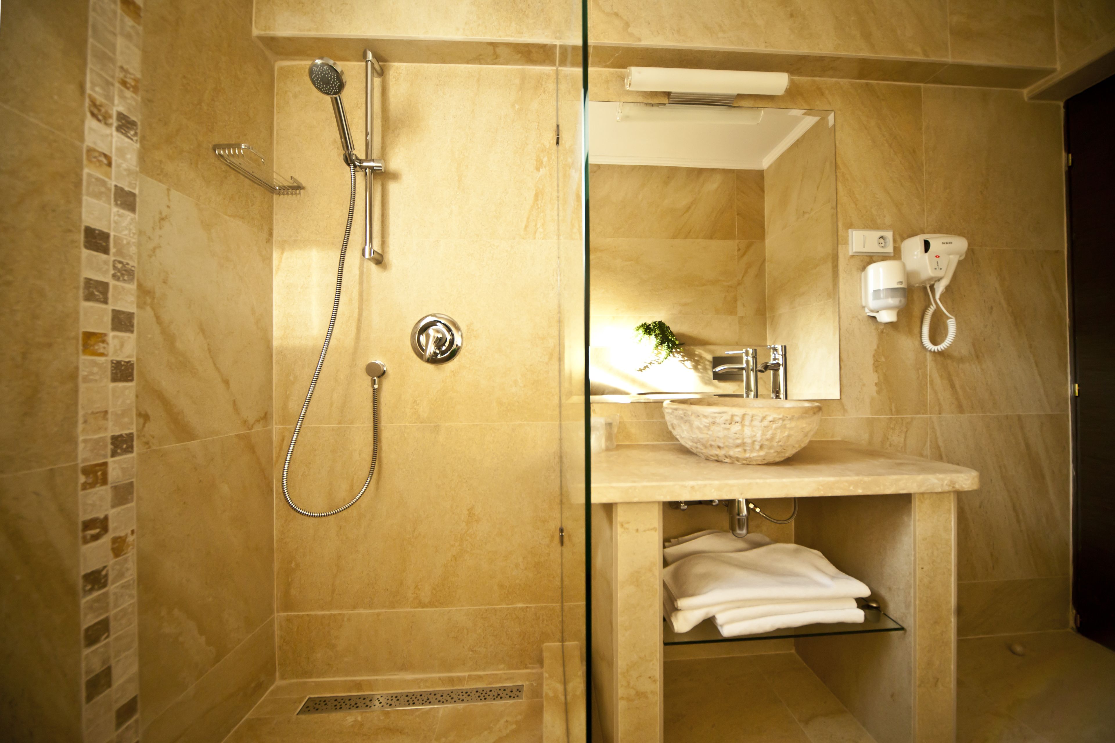 suite | bathroom | hair dryer, towels