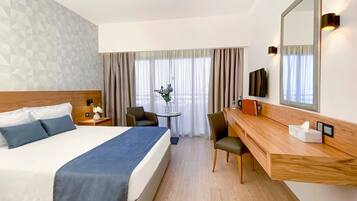 In-room safe, desk, laptop workspace, blackout curtains