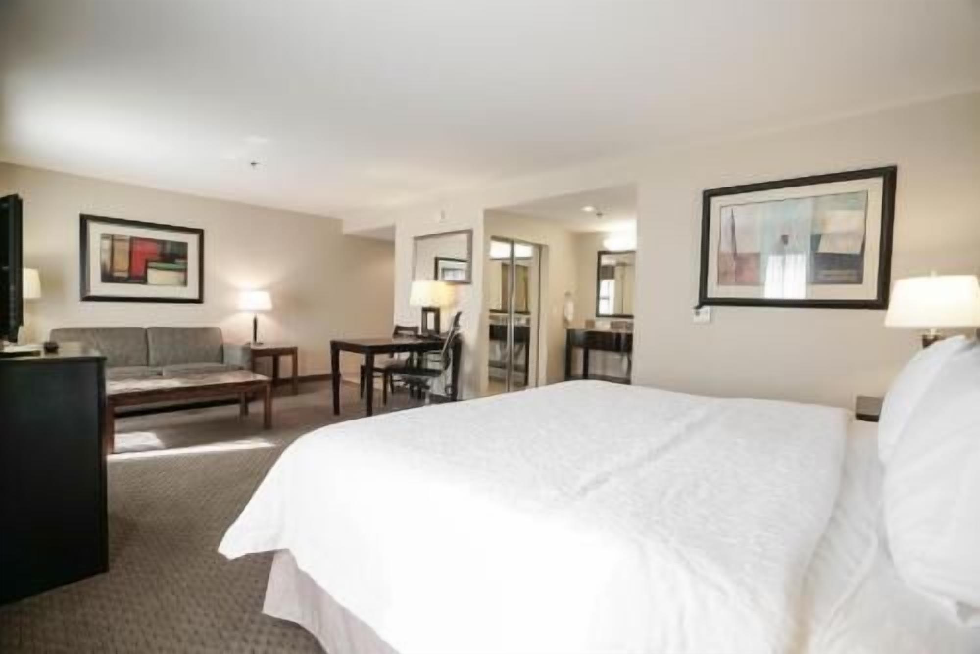 Down comforters, desk, blackout drapes, iron/ironing board