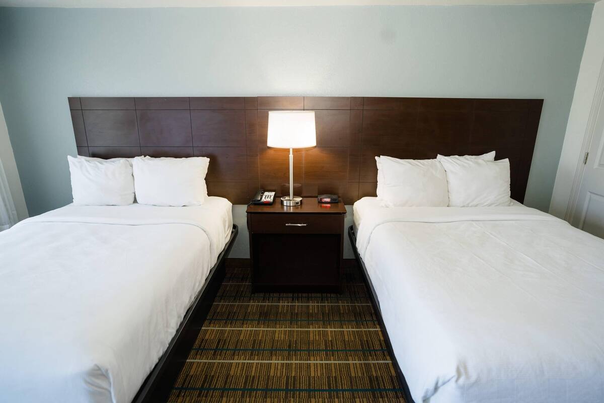 Room, 2 Double Beds, Smoking | Hypo-allergenic bedding, pillowtop beds, individually decorated