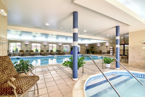 Indoor pool, open 10 AM to 8 PM, pool loungers