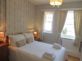 Habitación doble, baño privado | 1 dormitorio