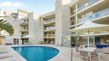 2 outdoor pools, pool umbrellas, pool loungers