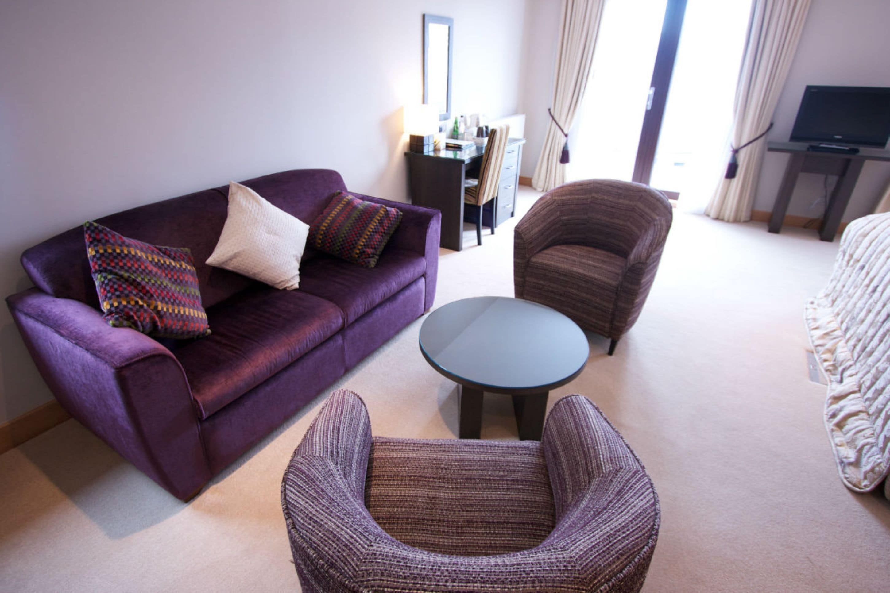 superior deluxe double room, non smoking | living area | flat-screen tv