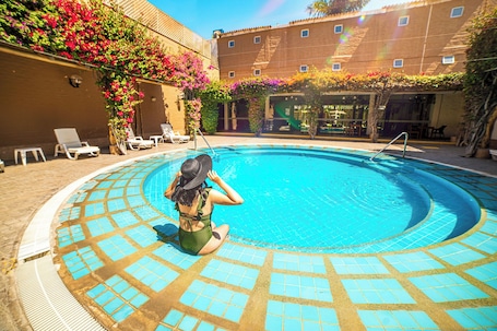 Una piscina al aire libre. Casa Andina Standard Nasca