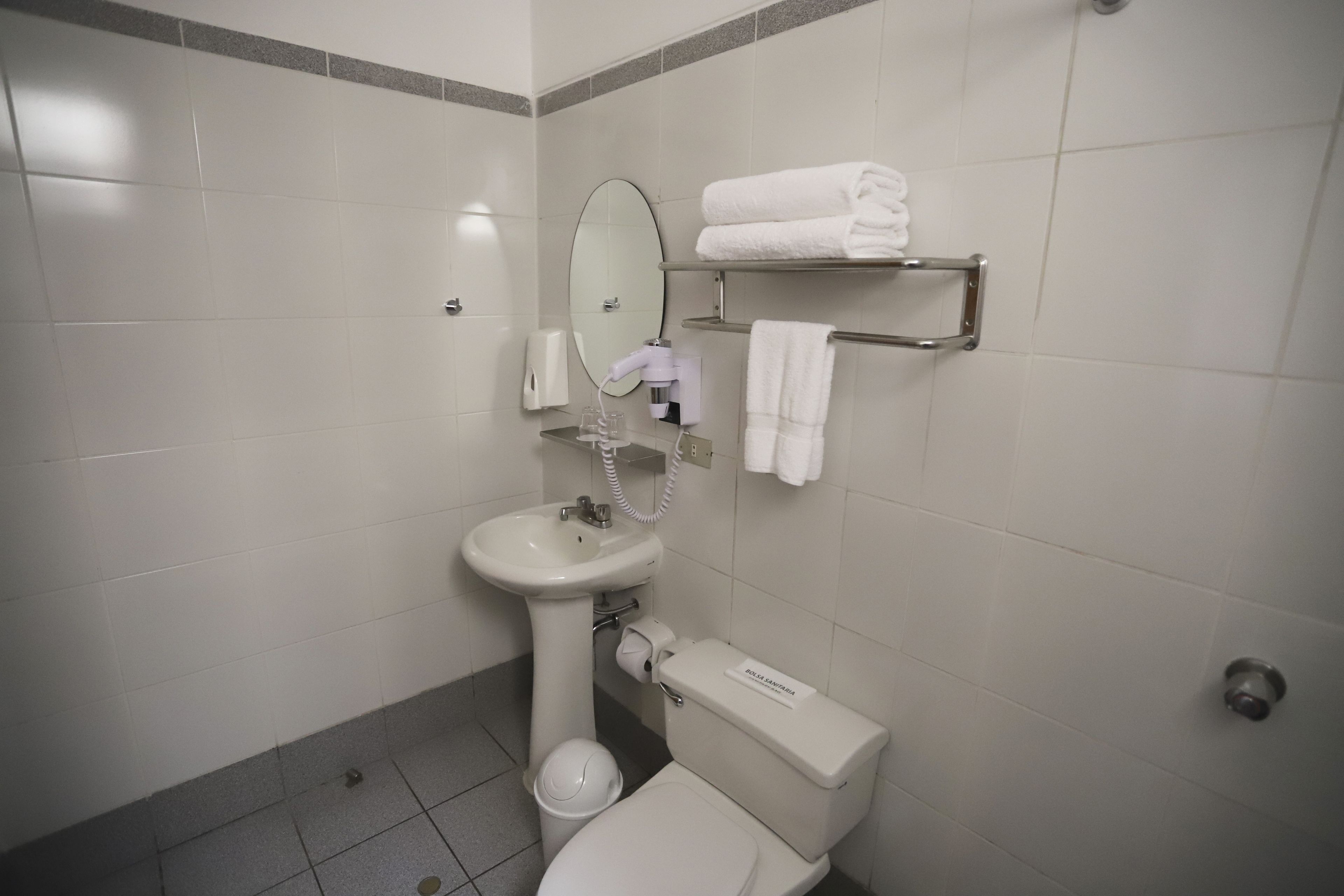 traditional double room, 1 queen bed | bathroom | shower, hair dryer, towels