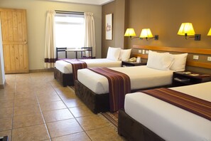 Traditional Triple Room, 3 Single Beds | In-room safe, desk, free WiFi, bed sheets