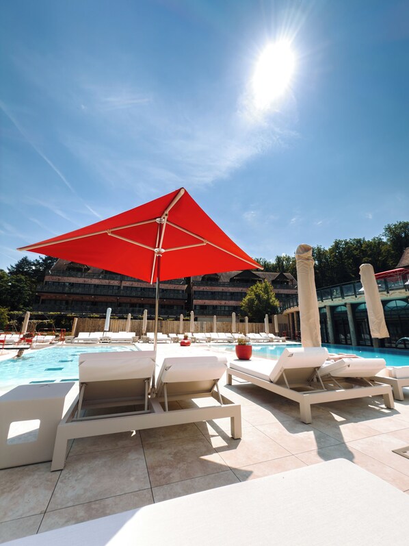 Indoor pool, outdoor pool, pool umbrellas, pool loungers