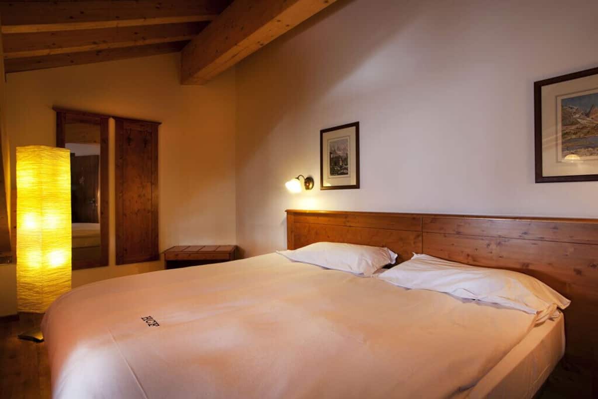 Junior Room | Premium bedding, down comforters, memory foam beds, laptop workspace