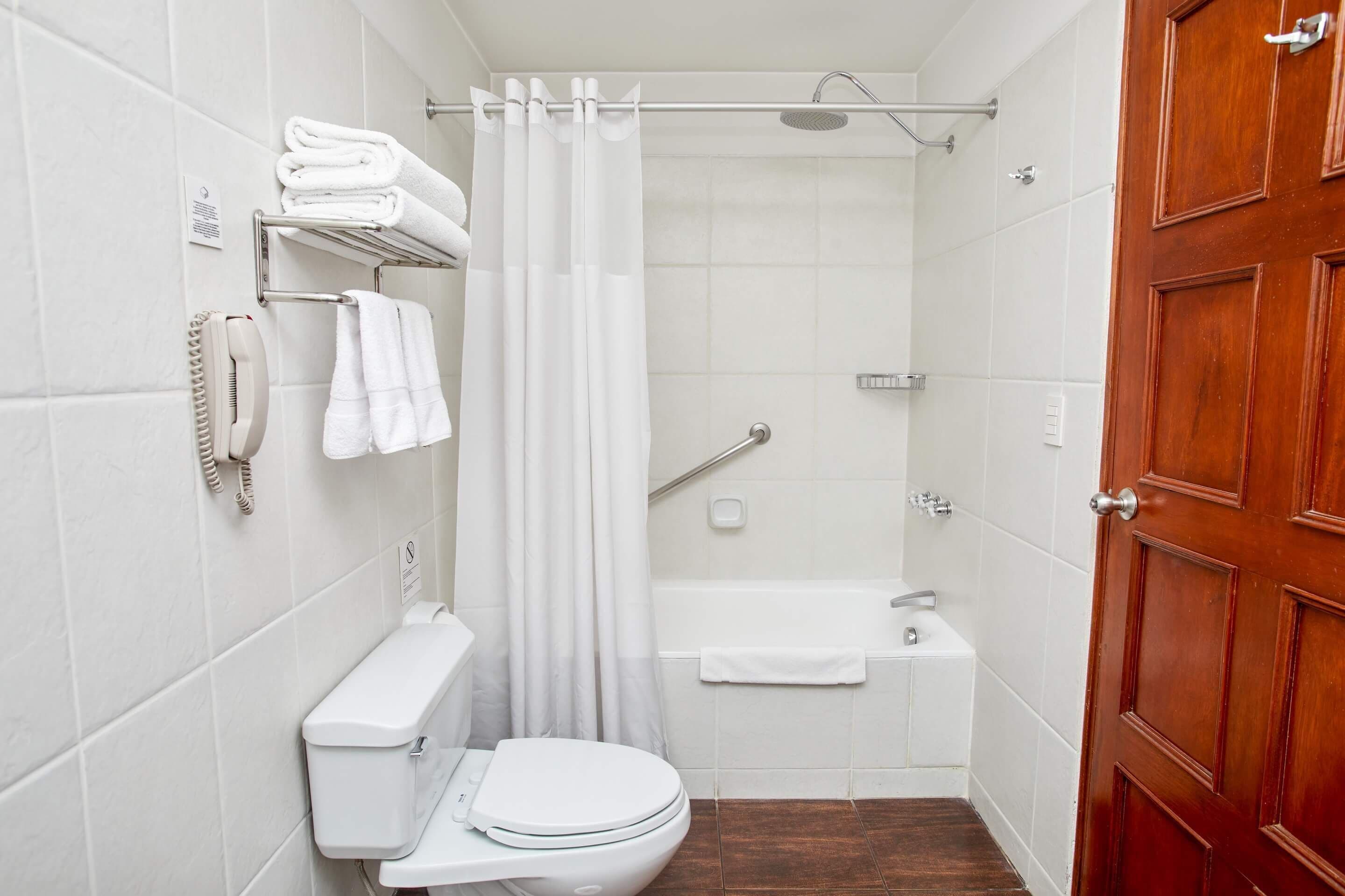 superior room, 1 king bed | bathroom | free toiletries, hair dryer, bathrobes, towels