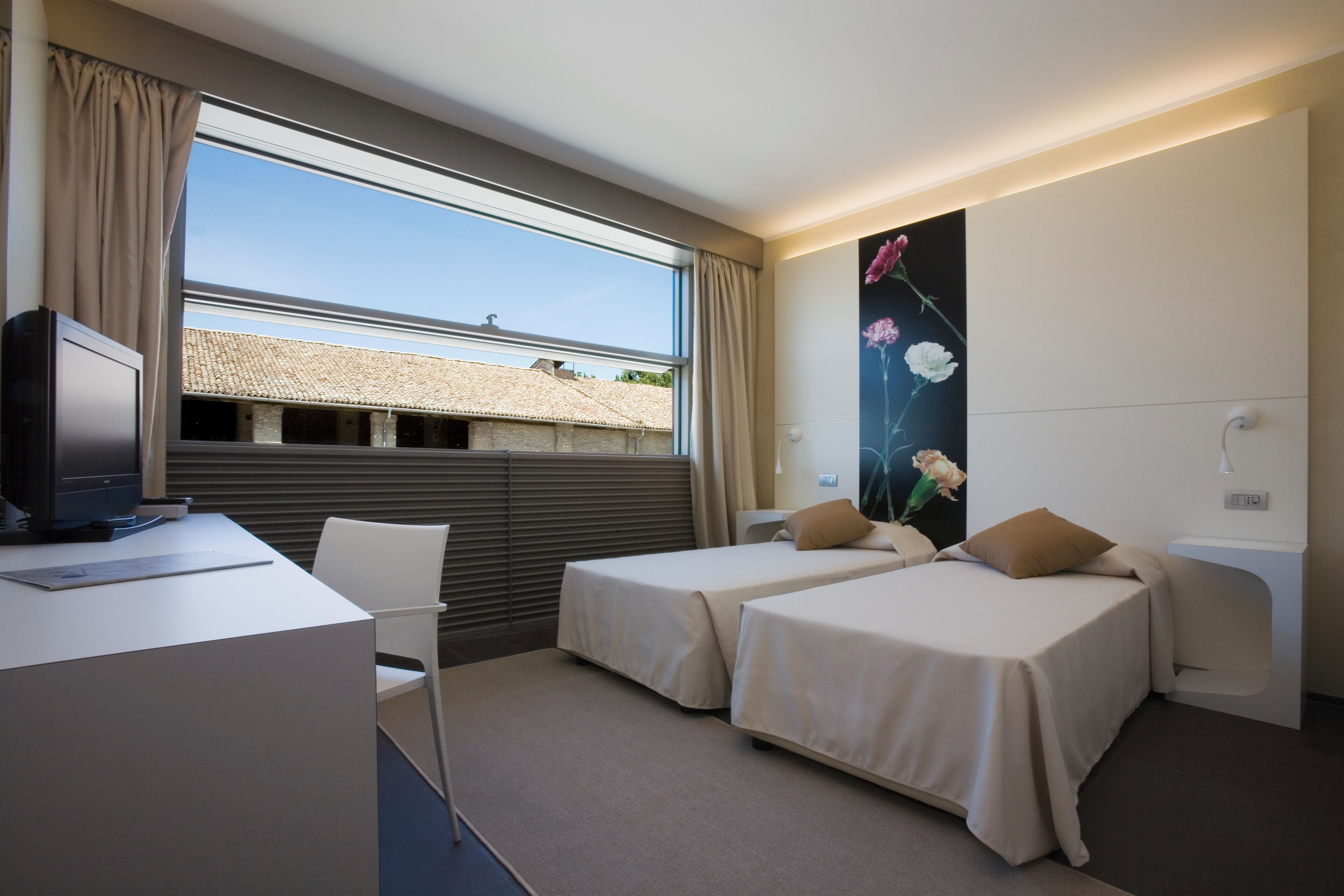 Memory-foam beds, minibar, in-room safe, desk