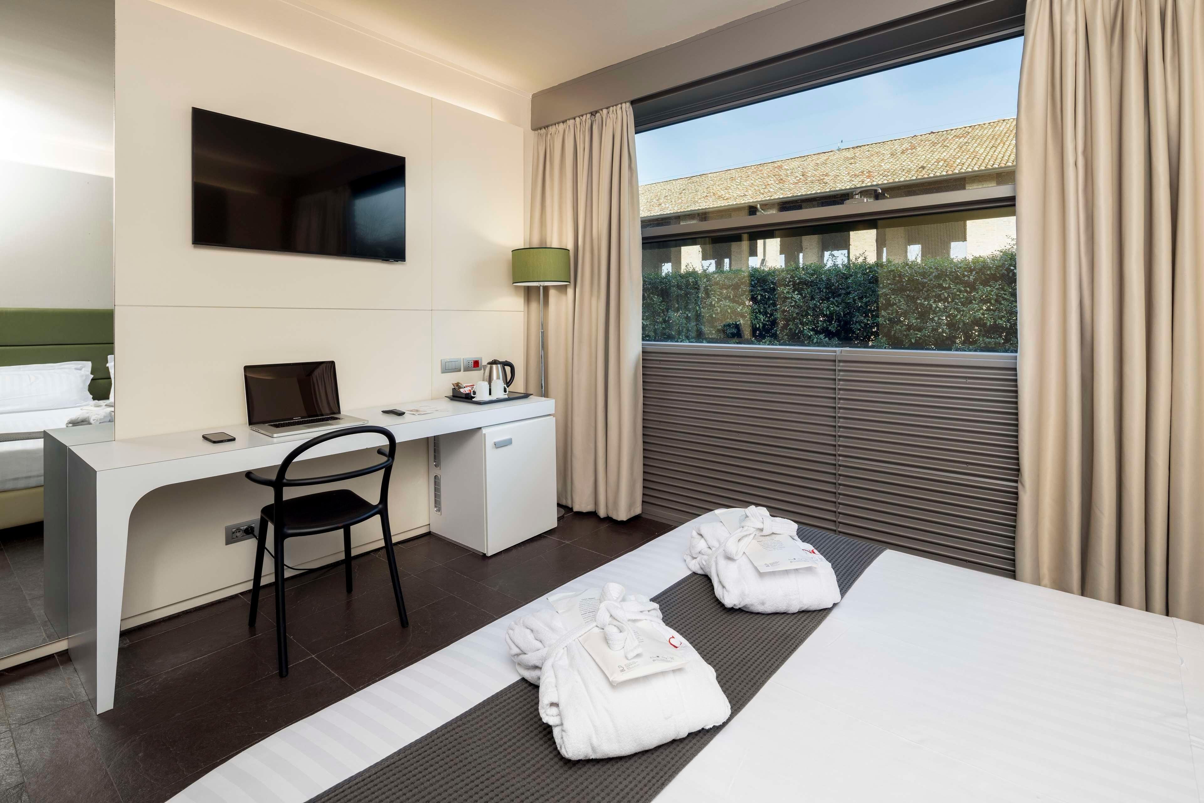 Memory-foam beds, minibar, in-room safe, desk