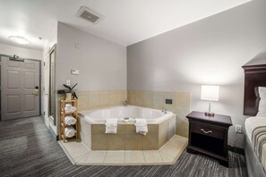 Suite, 1 King Bed, Non Smoking, Jetted Tub | Premium bedding, desk, blackout curtains, iron/ironing board
