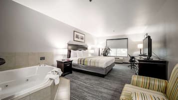 Suite, 1 King Bed, Non Smoking, Jetted Tub | Premium bedding, desk, blackout drapes, iron/ironing board