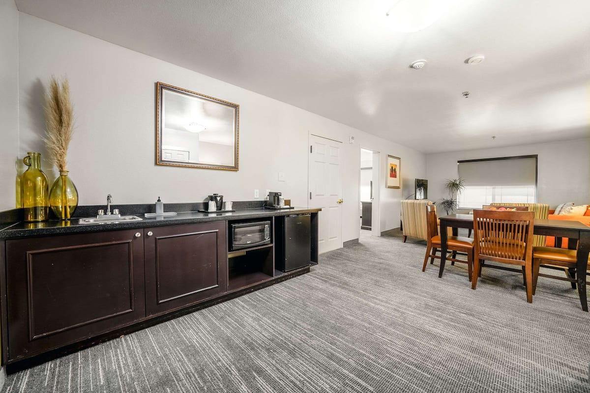 Suite, 1 King Bed, Non Smoking (Extended Stay) | 1 bedroom, premium bedding, desk, blackout drapes