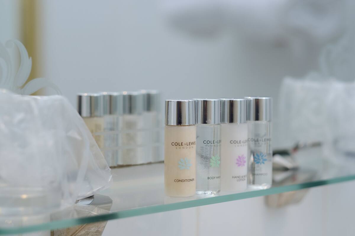 junior suite | bathroom amenities | combined shower/bathtub, hair dryer, slippers, towels