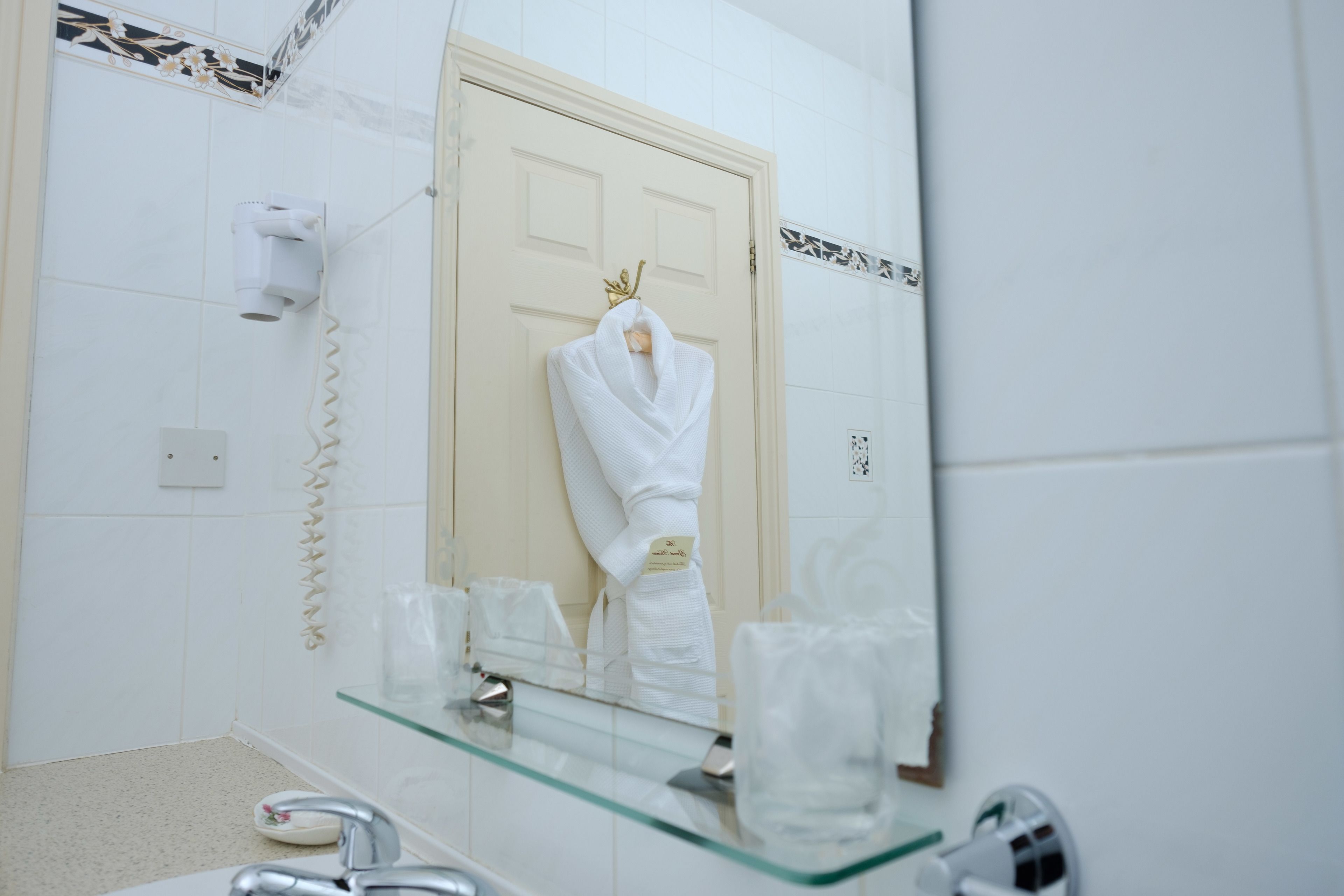 twin room | bathroom | combined shower/bathtub, hair dryer, slippers, towels