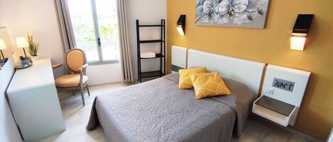 Desk, blackout curtains, soundproofing, iron/ironing board