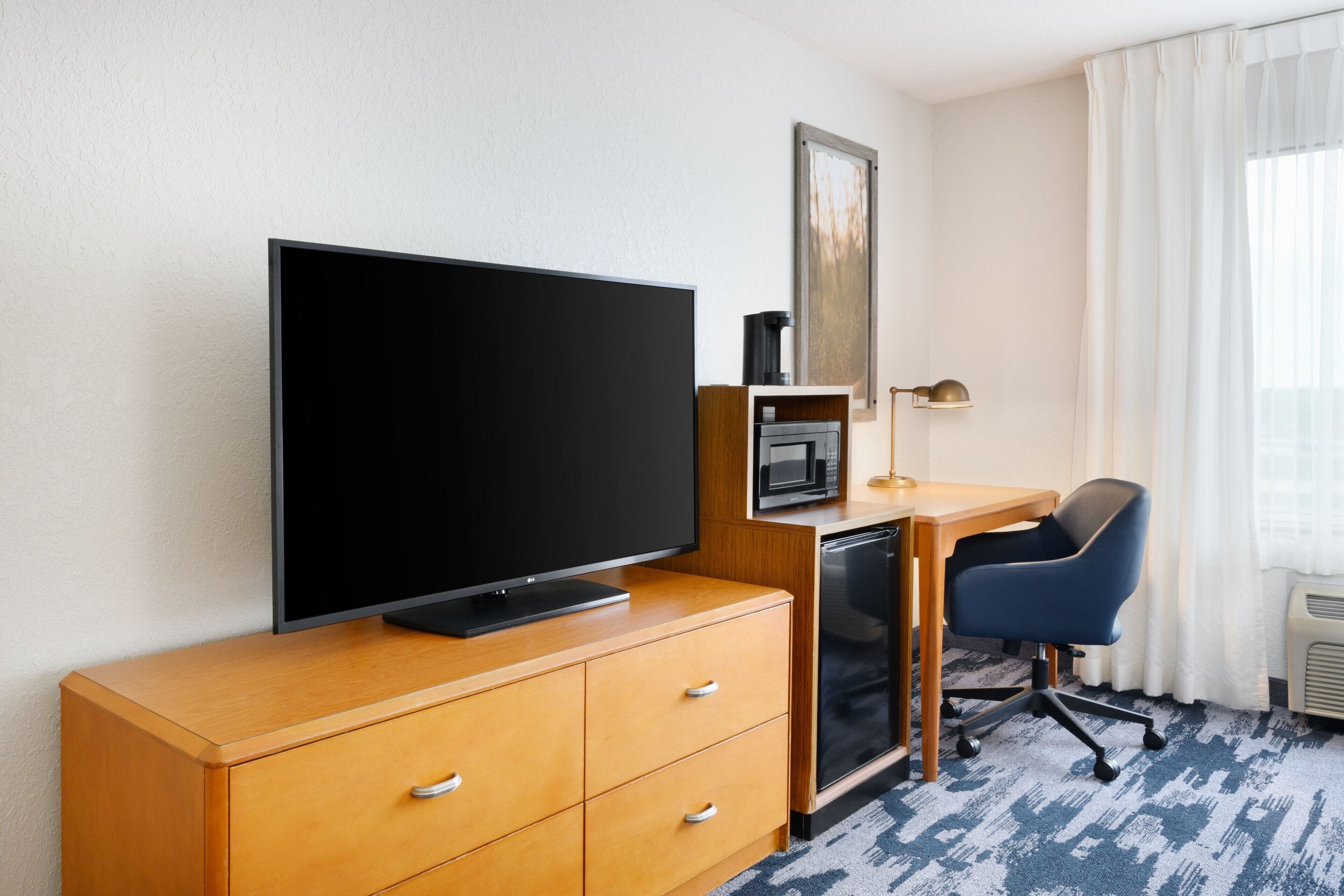 premium bedding, desk, laptop workspace, iron/ironing board