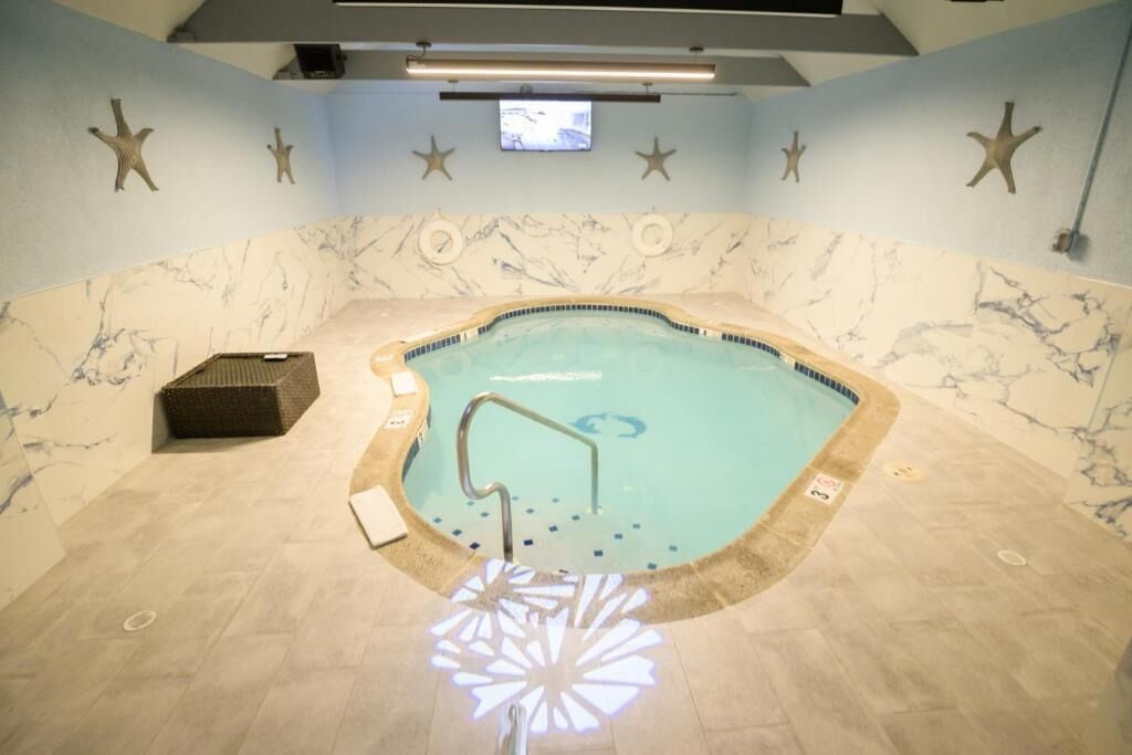 Dove Swimming Pool Suite with Private Heated Indoor Swimming, Jetted Tub & Fireplace | 1 bedroom, premium bedding, desk, soundproofing