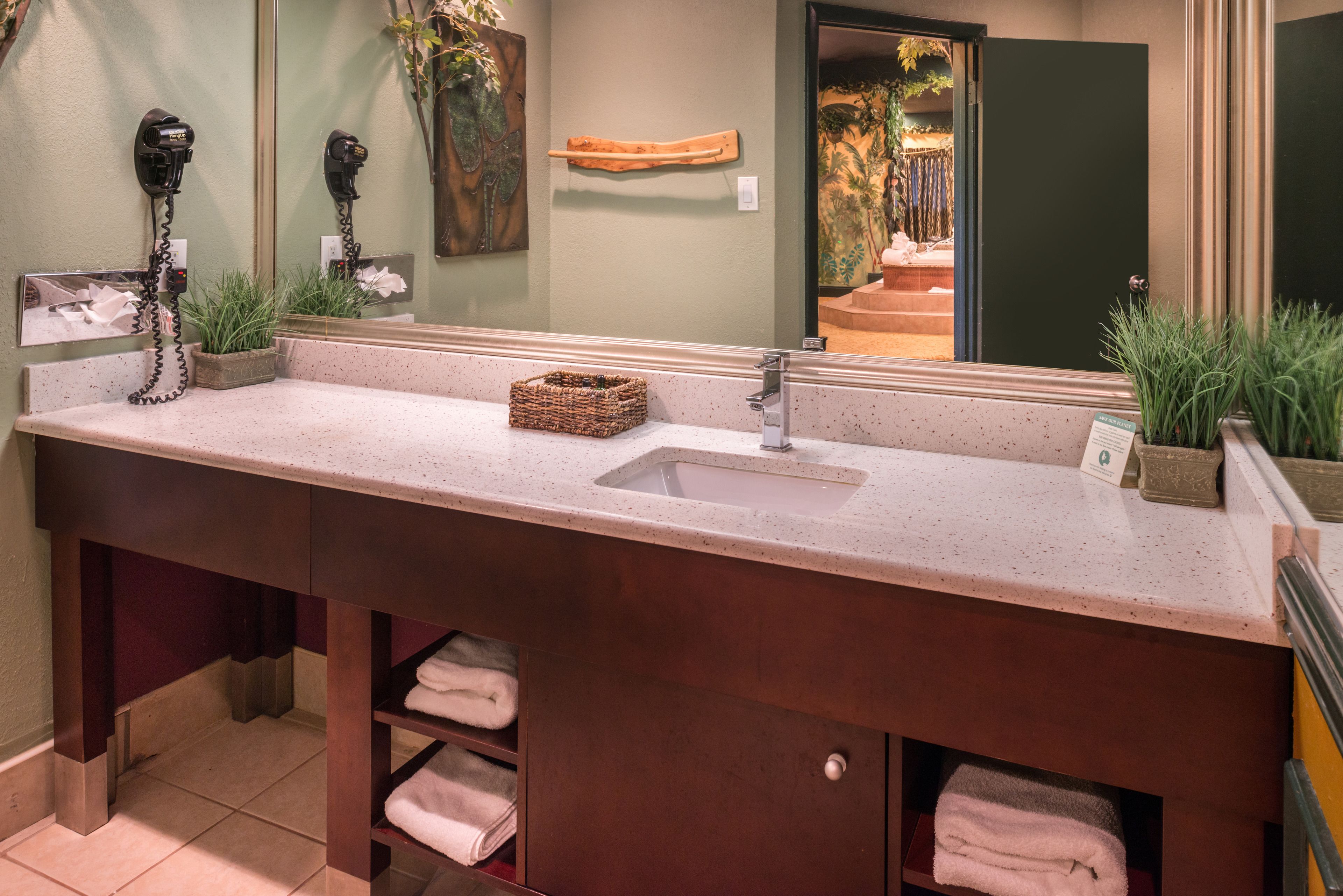 jungle theme suite with jetted tub & fireplace (featured on travel channel in 2016) | premium bedding, individually furnished, desk, soundproofing