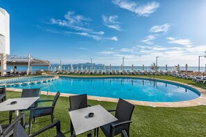 Outdoor pool, pool umbrellas, pool loungers