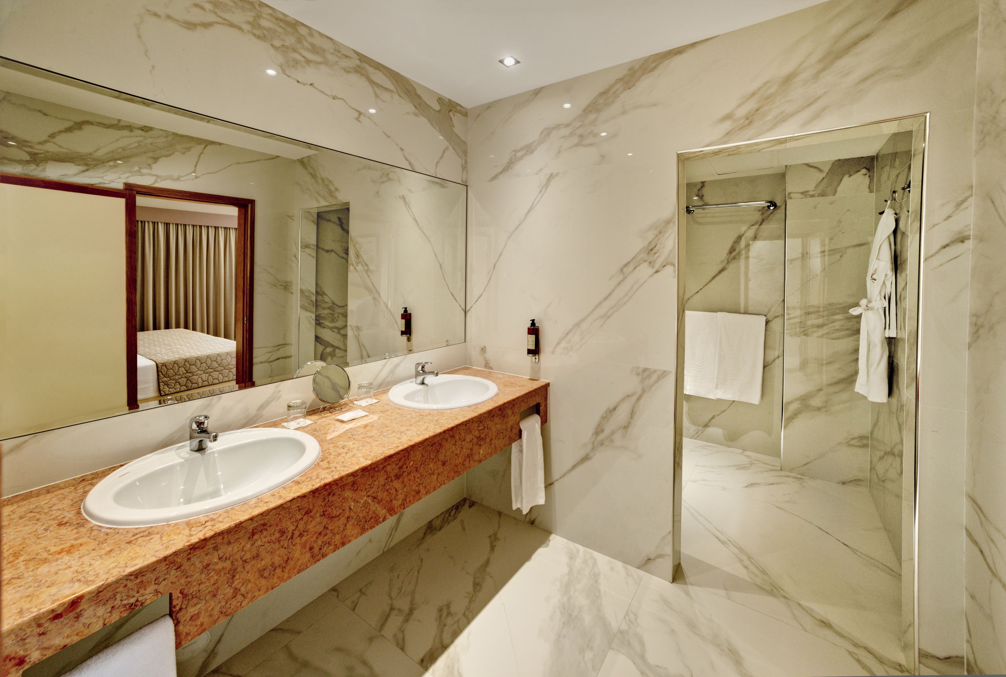 magnolia suite | bathroom | shower, hair dryer, towels