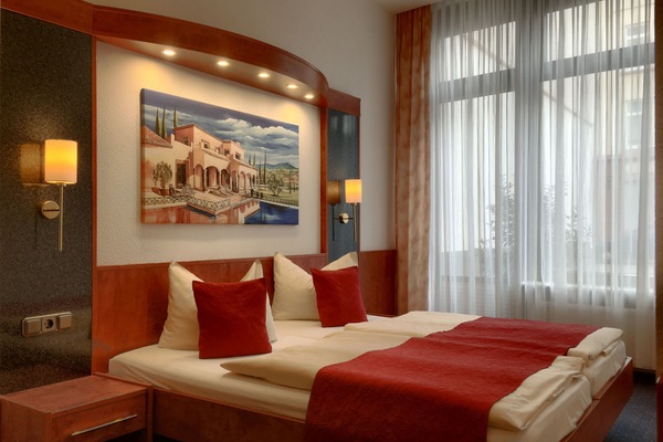 Standard Double or Twin Room | Minibar, desk, laptop workspace, blackout drapes