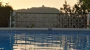 Outdoor pool, open 8:30 AM to 9:30 PM, pool loungers