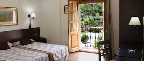 In-room safe, desk, laptop workspace, blackout curtains