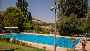 Outdoor pool, open 8:30 AM to 9:30 PM, sun loungers