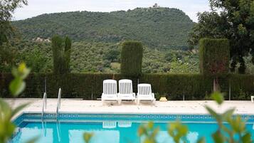 Outdoor pool, open 8:30 AM to 9:30 PM, sun loungers