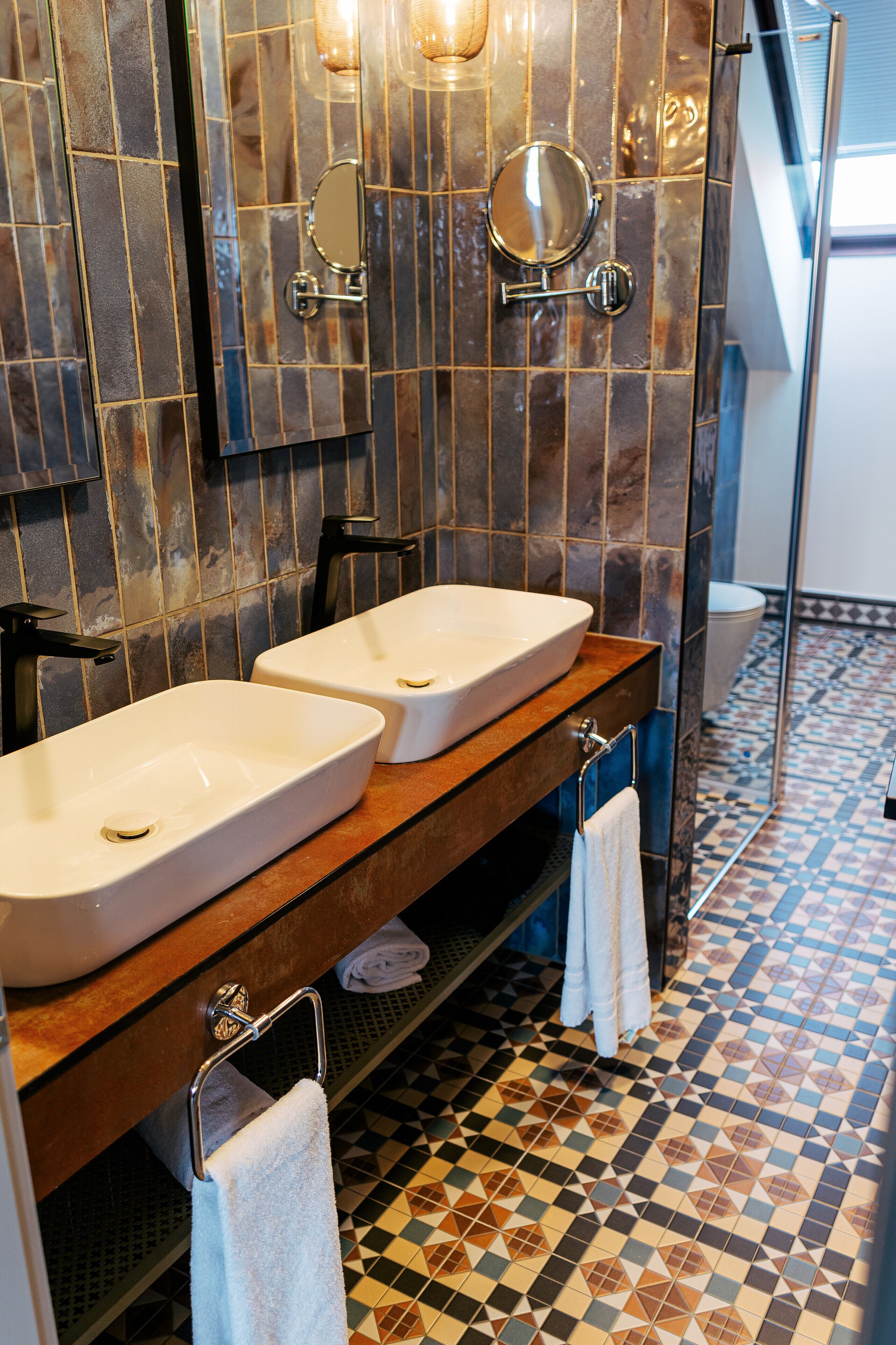 junior studio suite | bathroom | free toiletries, hair dryer, bathrobes, towels