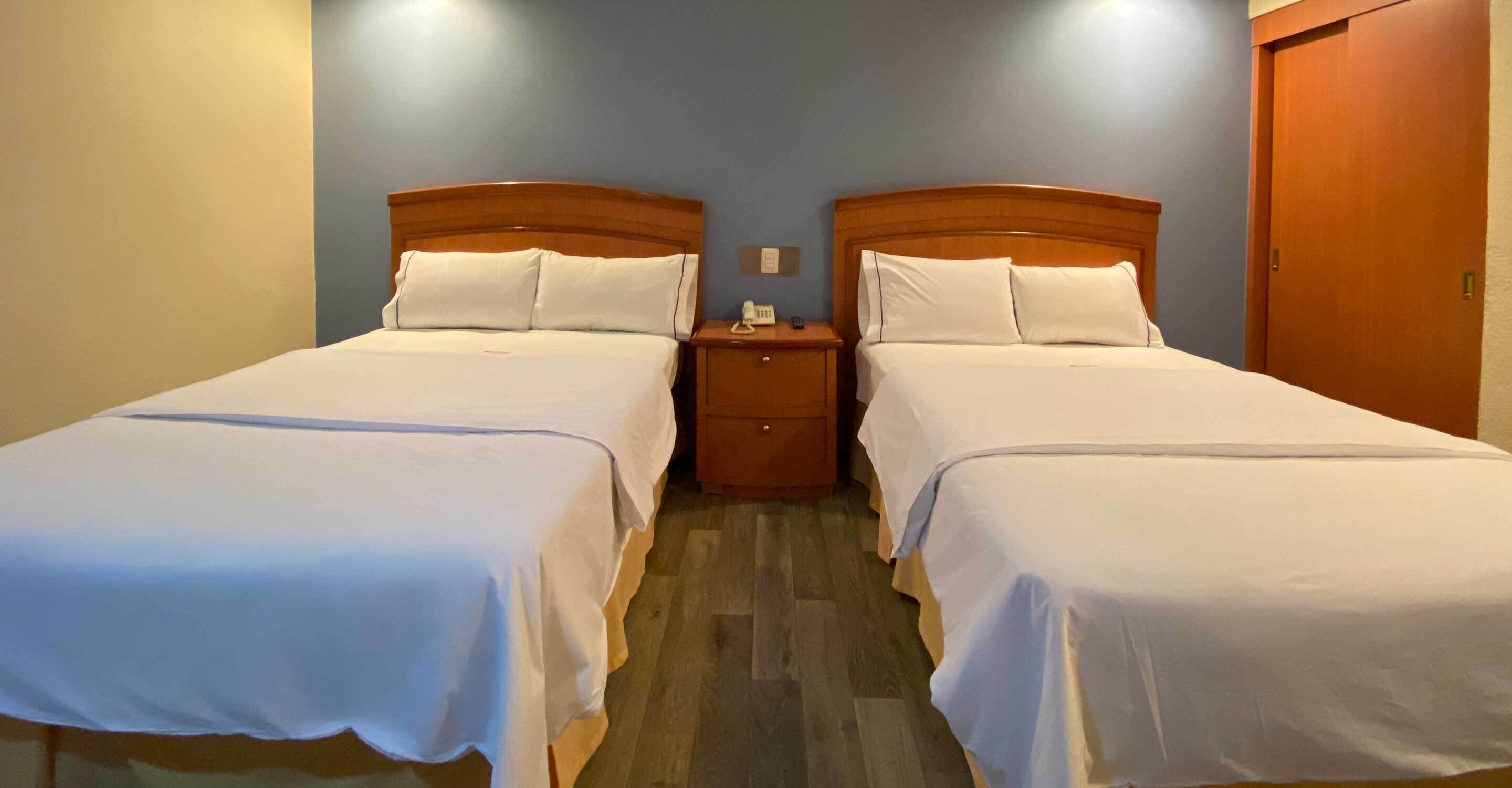 standard room, 2 double beds | in-room safe, desk, blackout curtains, free wifi