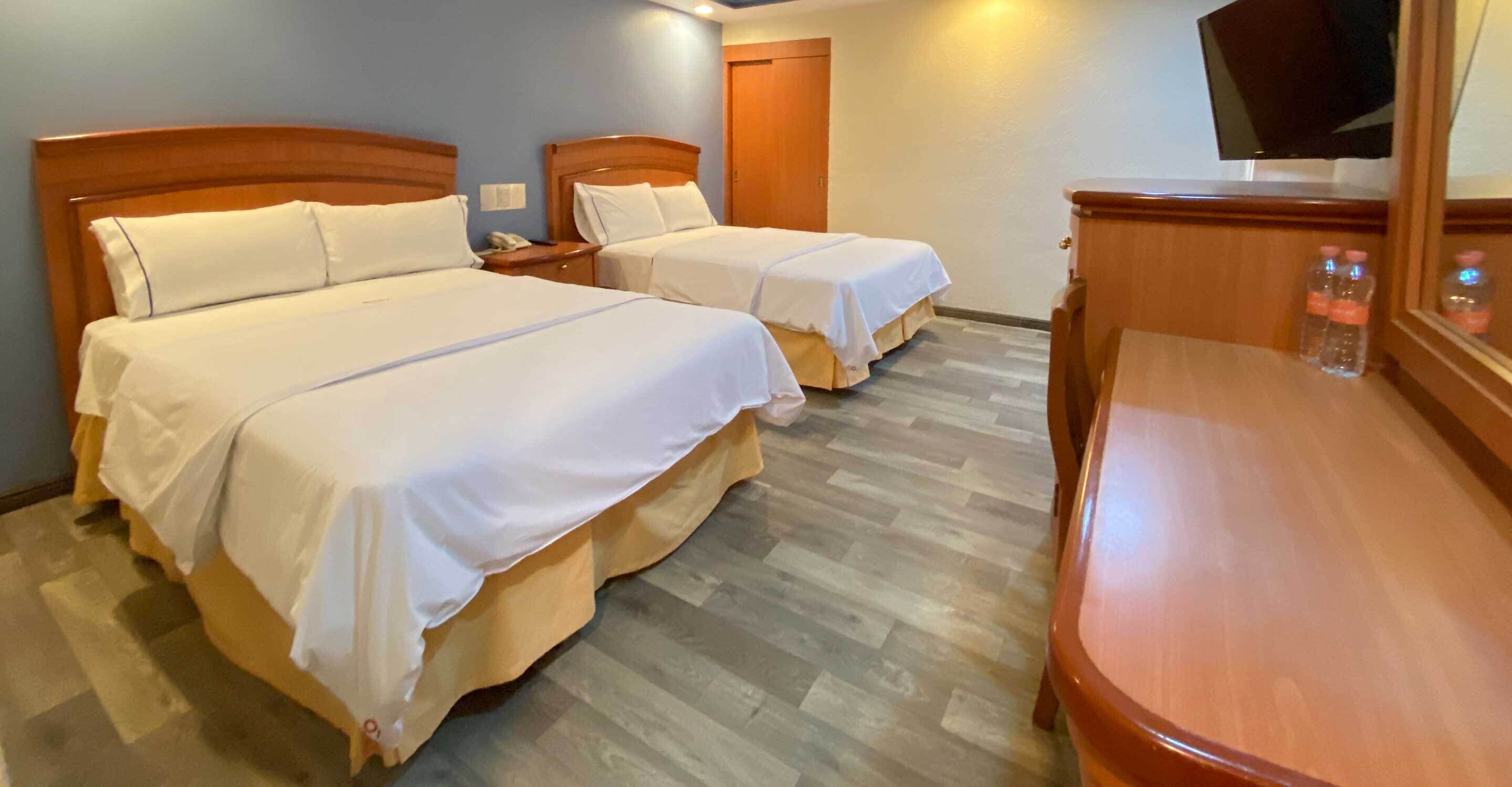 standard room, 2 double beds | in-room safe, desk, blackout curtains, free wifi