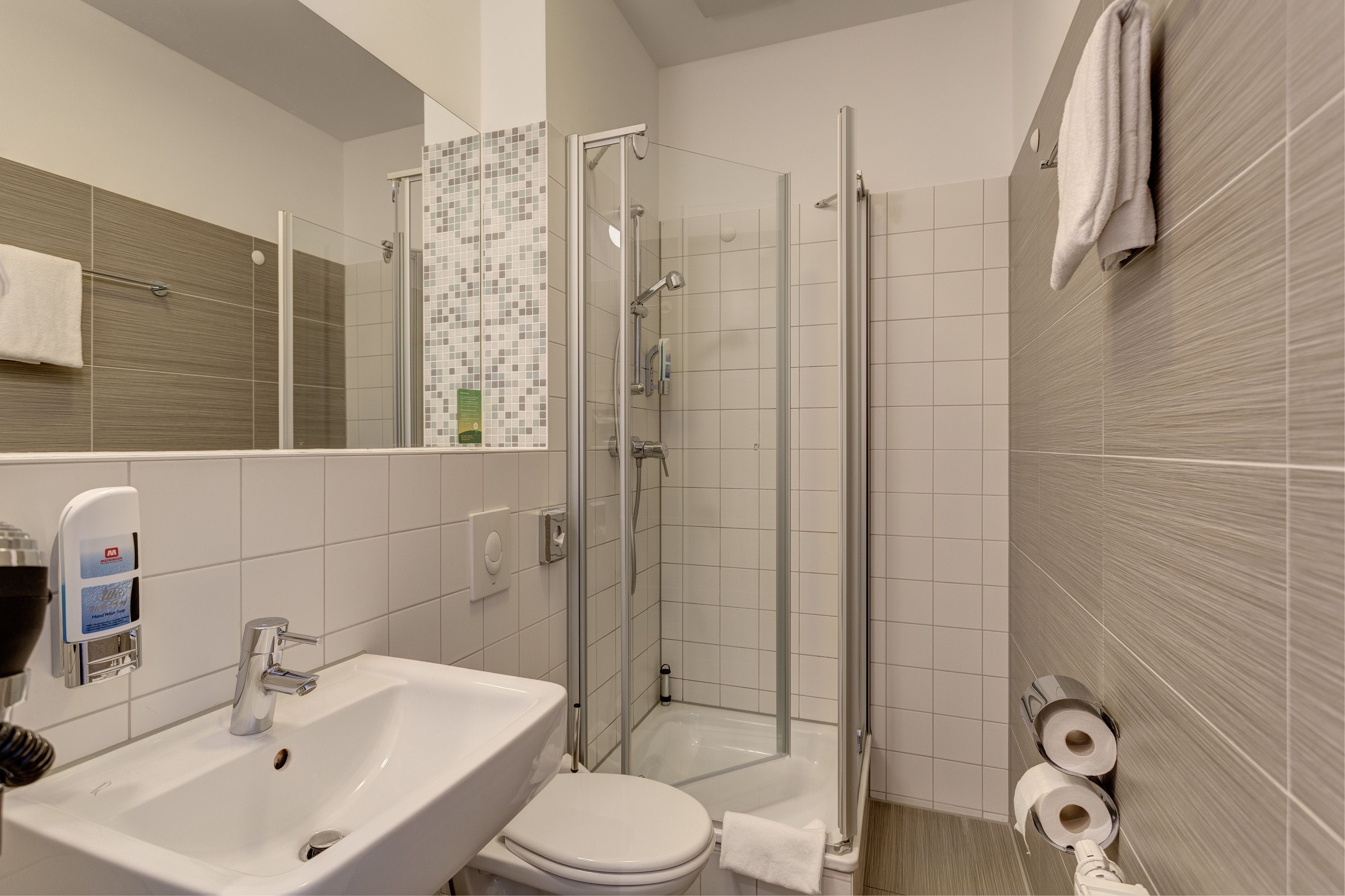 Shower, free toiletries, hair dryer, towels