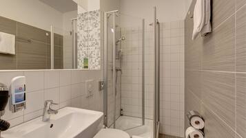 Shower, free toiletries, hair dryer, towels