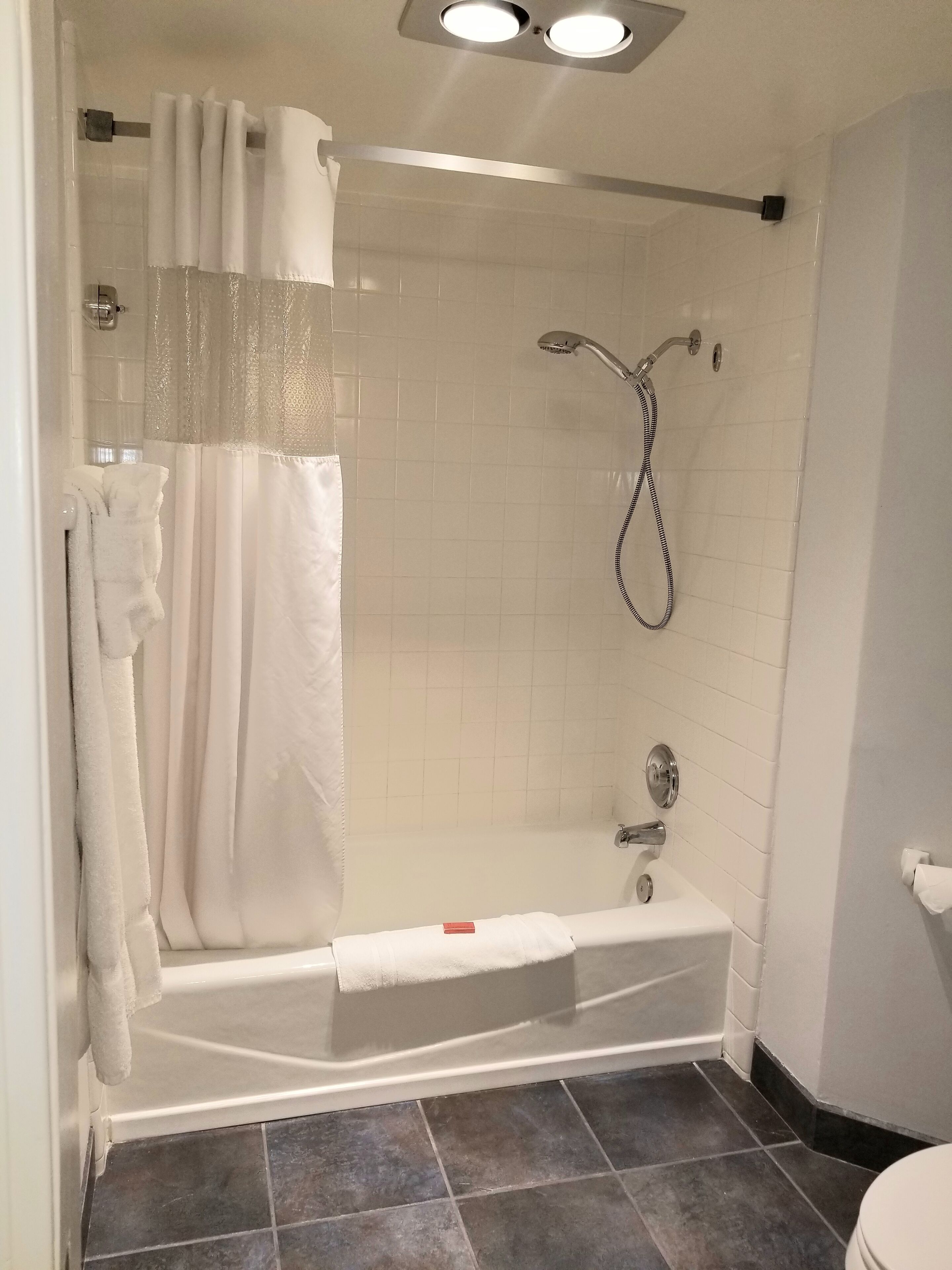 combined shower/bathtub, free toiletries, hair dryer, bathrobes