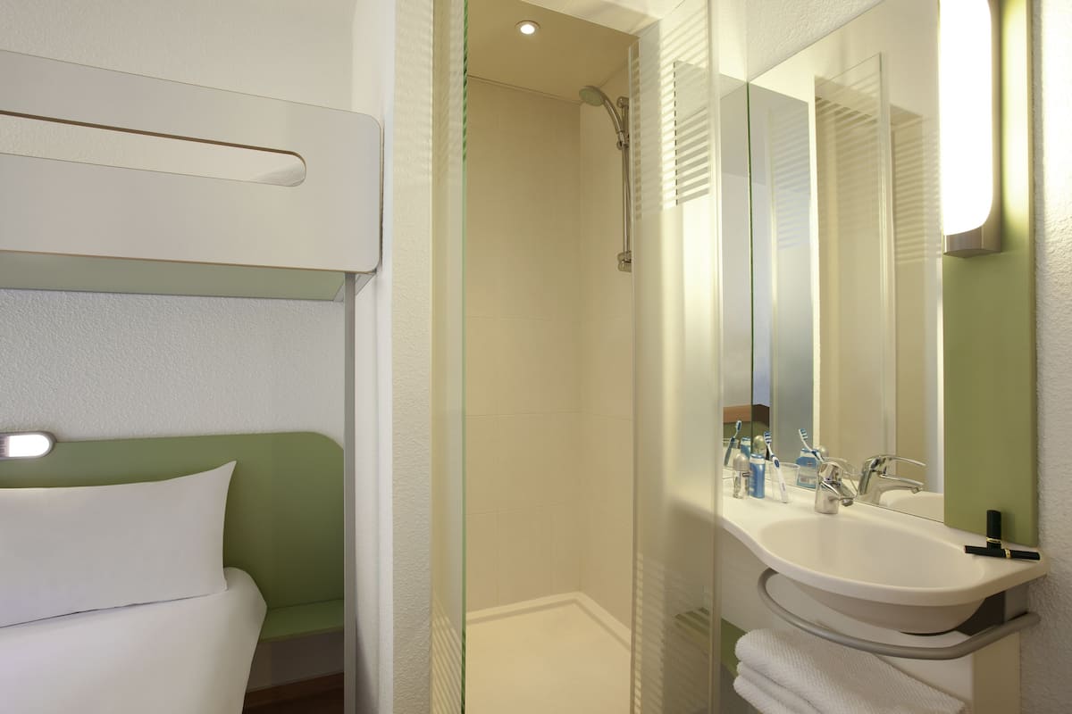 shower, eco-friendly toiletries, hair dryer, towels