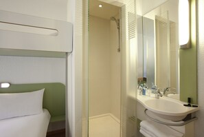 Shower, eco-friendly toiletries, hair dryer, towels