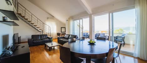 Apartment, 3 Bedrooms, Balcony | Living area | Flat-screen TV, DVD player