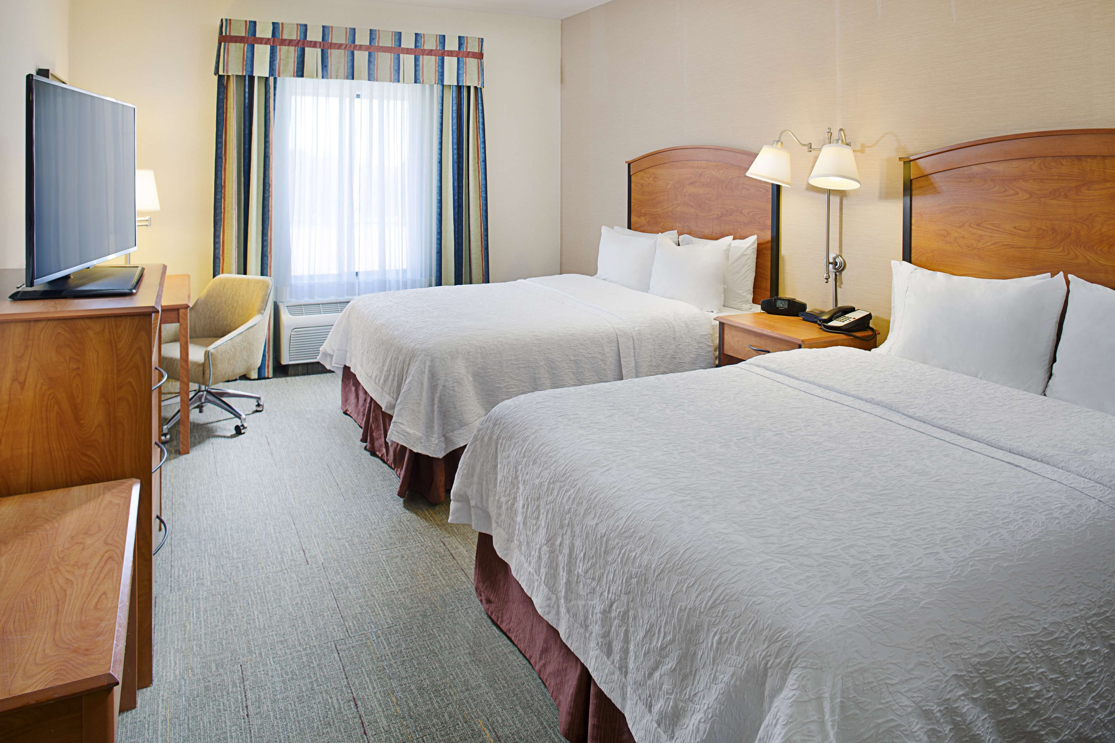 down duvets, pillow-top beds, in-room safe, desk