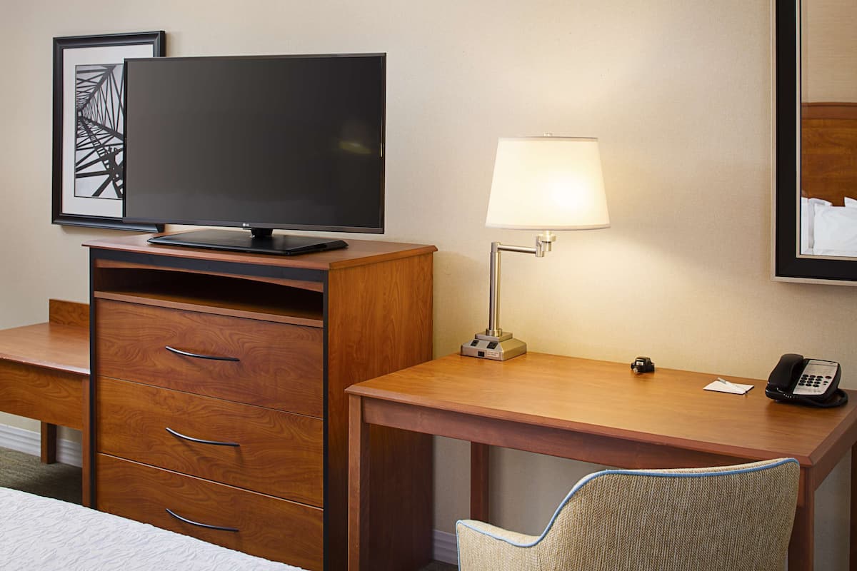 Down comforters, pillowtop beds, in-room safe, desk