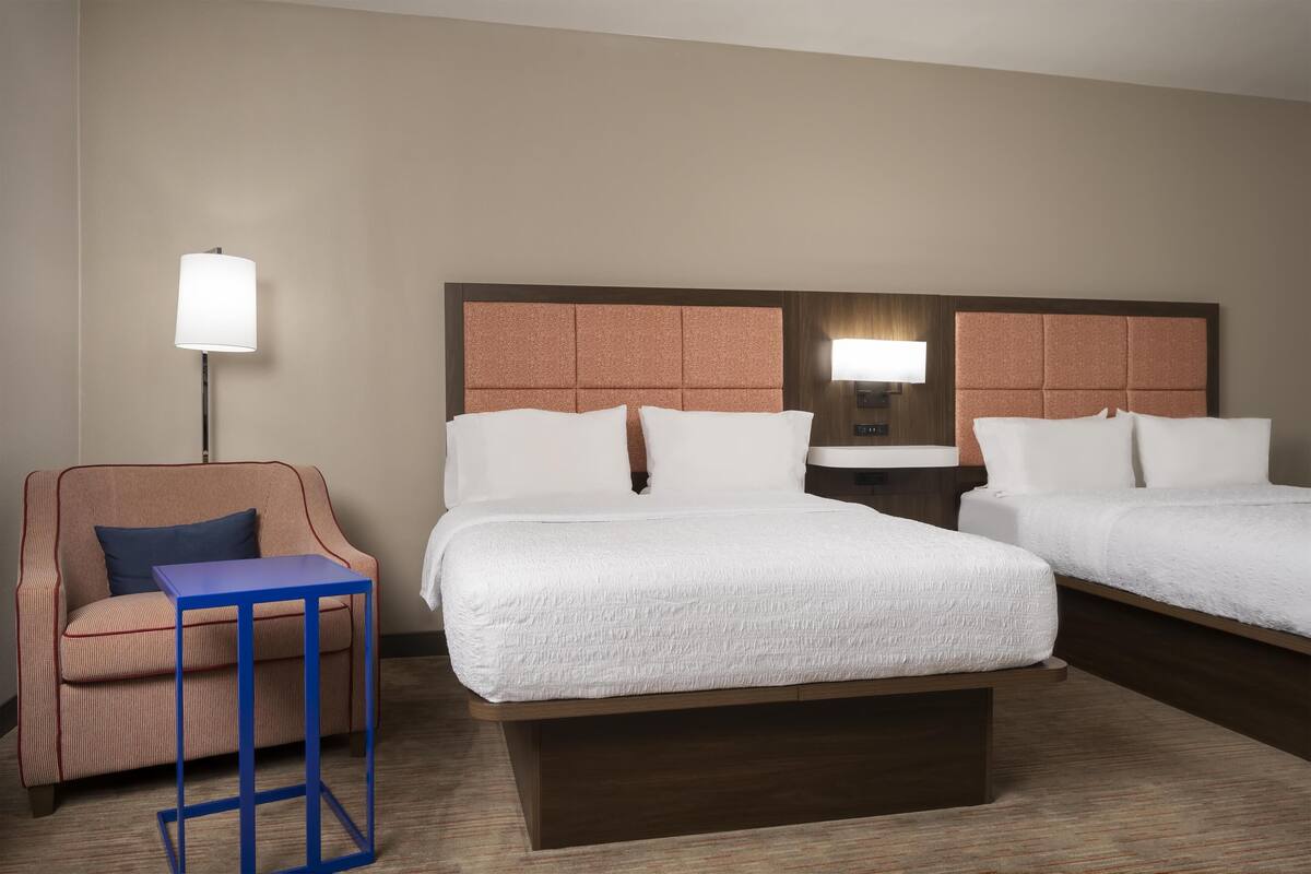 Down comforters, pillowtop beds, in-room safe, desk