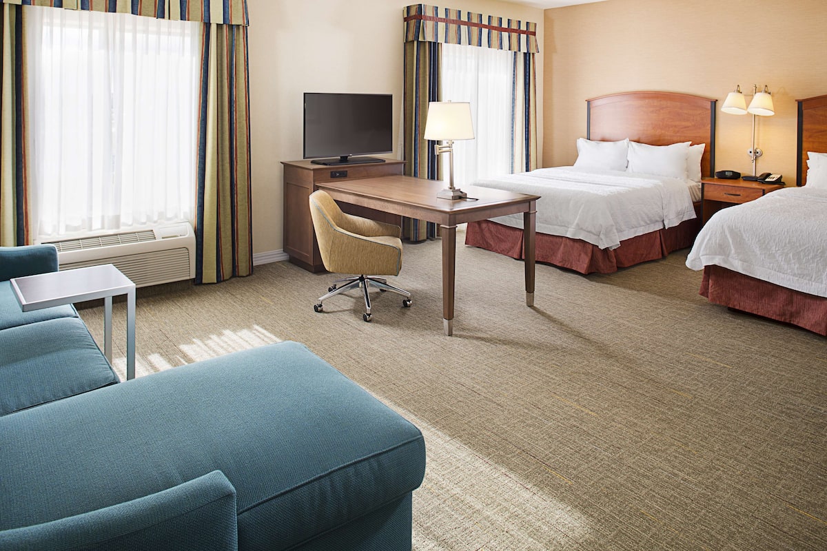 Down comforters, pillowtop beds, in-room safe, desk