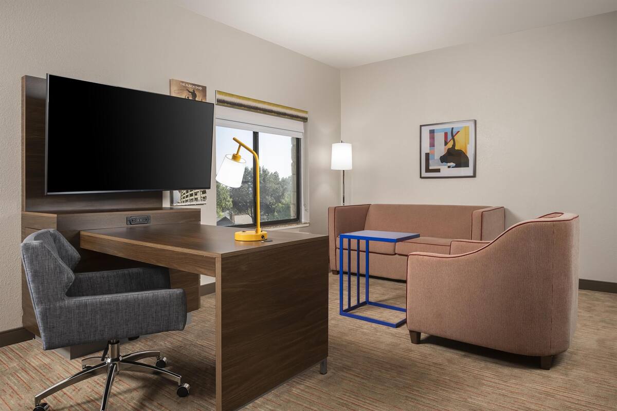 Down comforters, pillowtop beds, in-room safe, desk