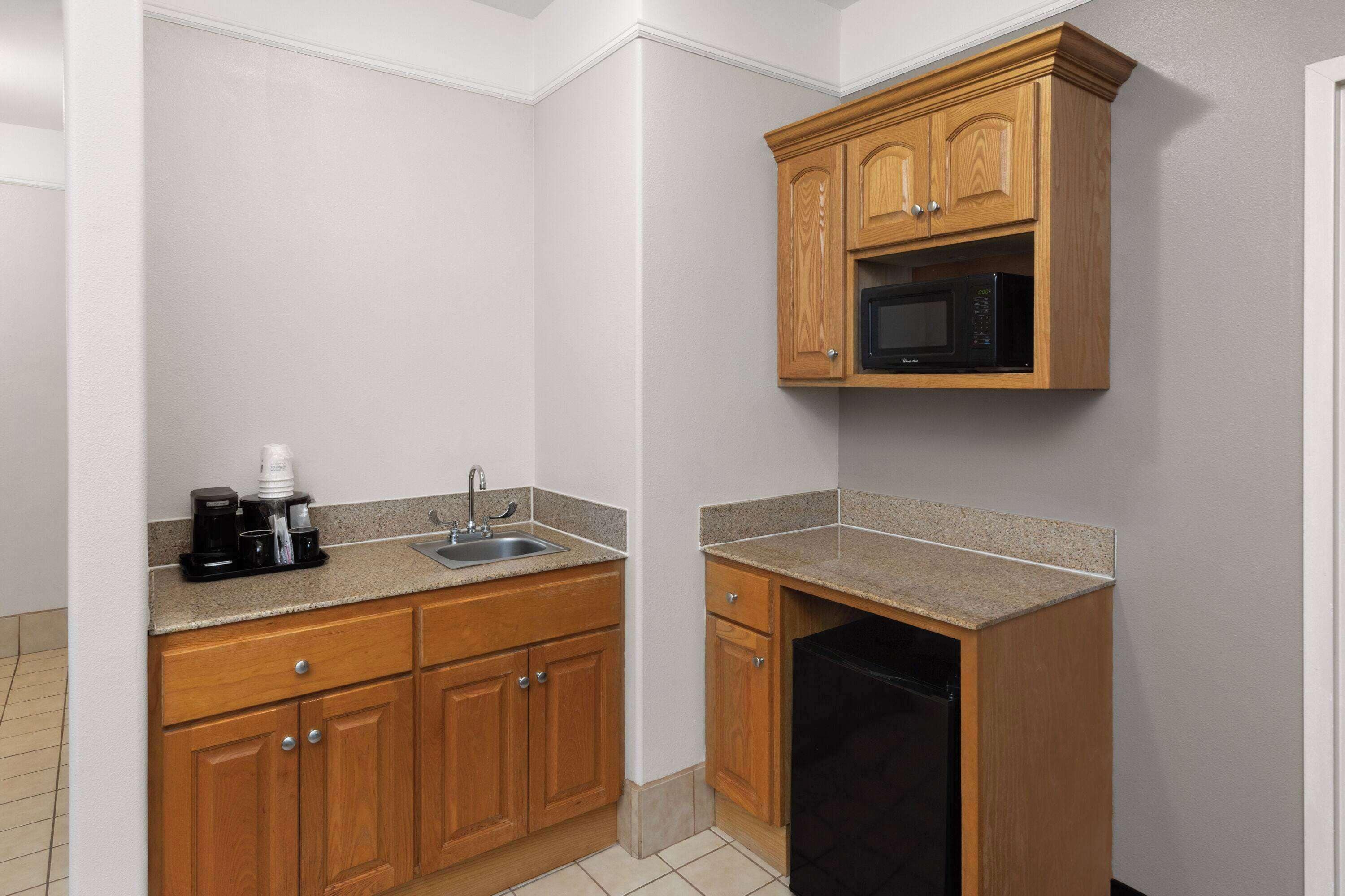 premium bedding, desk, blackout curtains, iron/ironing board